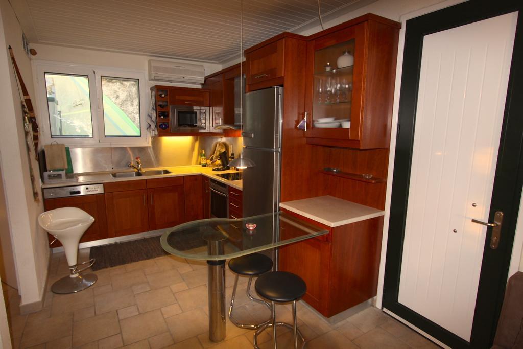Corfu Glyfada Menigos Beach Apartments Bagian luar foto