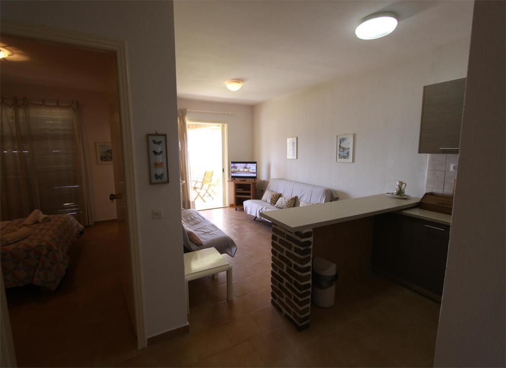 Corfu Glyfada Menigos Beach Apartments Bagian luar foto
